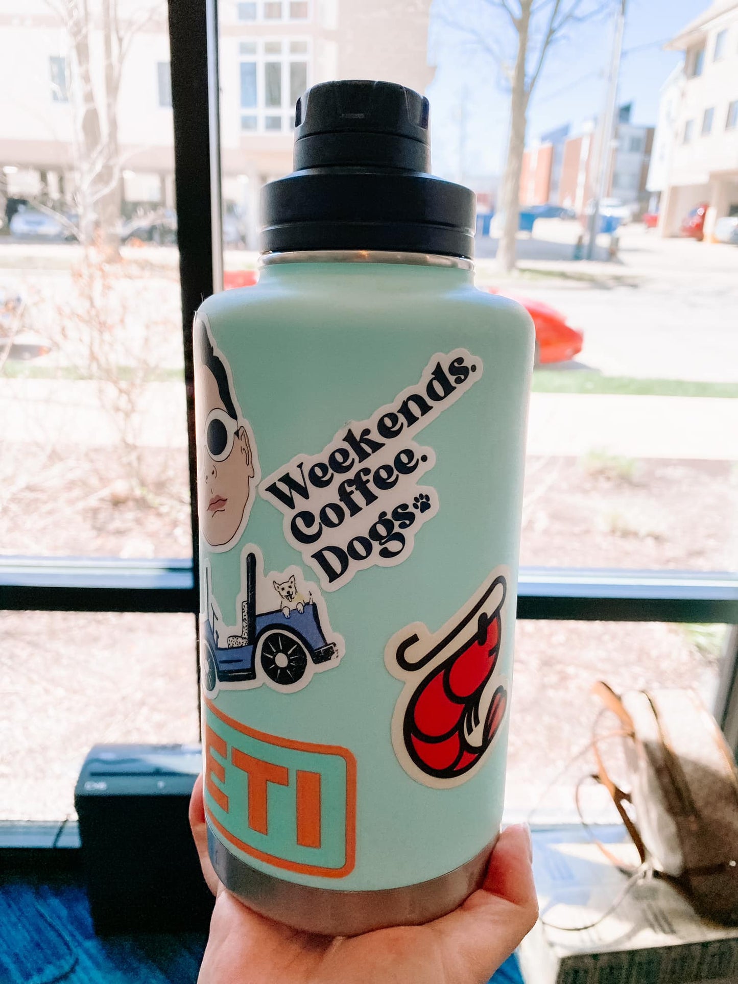 "Weekends. Coffee. Dogs." Sticker